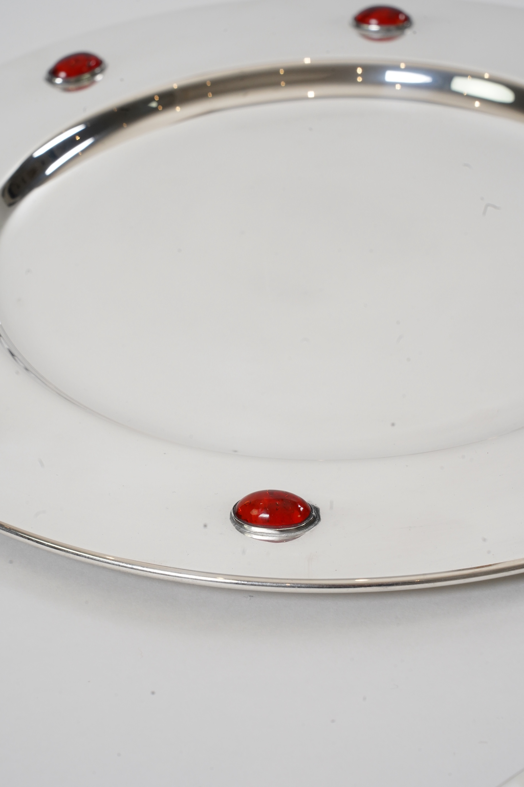 A set of six Glasgow School Arts & Crafts silver plated and cabochon glass set dinner plates